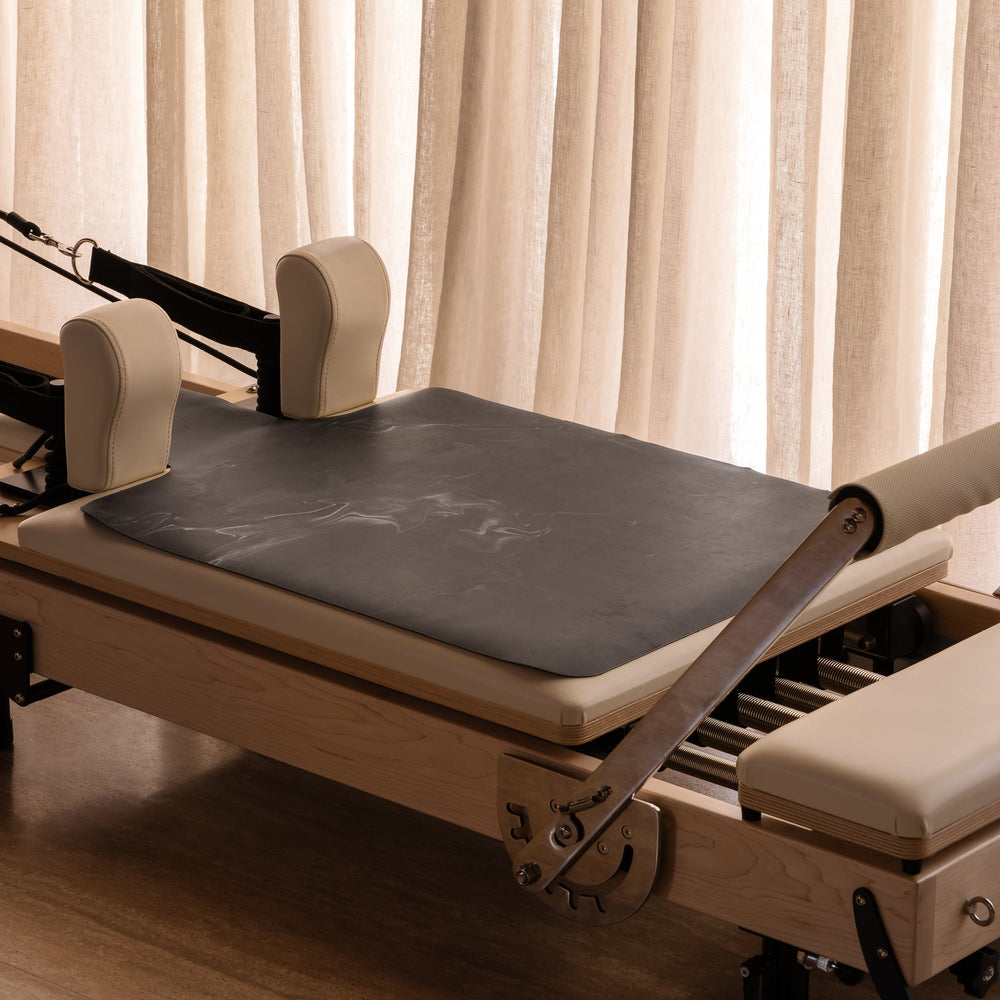 Black Wash Microfibre Reformer Mat - Flat Lay with Marble Pattern | Your Reformer
