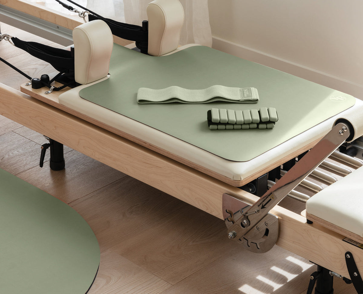 Sage Pilates Pack with Reformer Mat and Ankle Weights on Pilates Reformer | Your Reformer