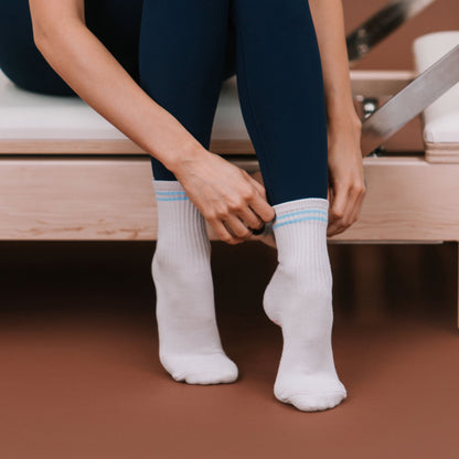 White Blue Stripe Crew Grip Socks - On Model Reformer | Your Reformer