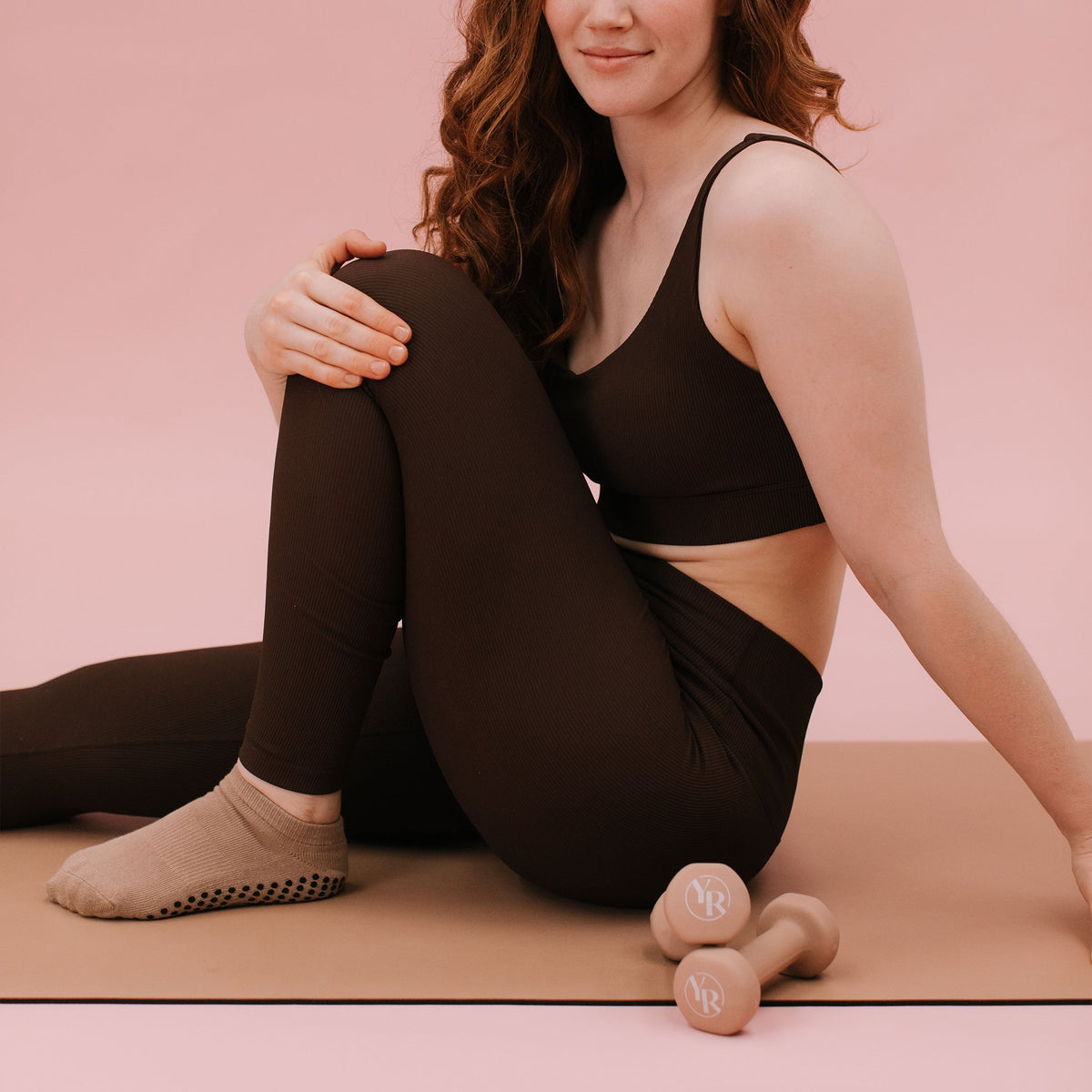 Taupe Ankle Grip Socks - On Model with Pilates Equipment | Your Reformer