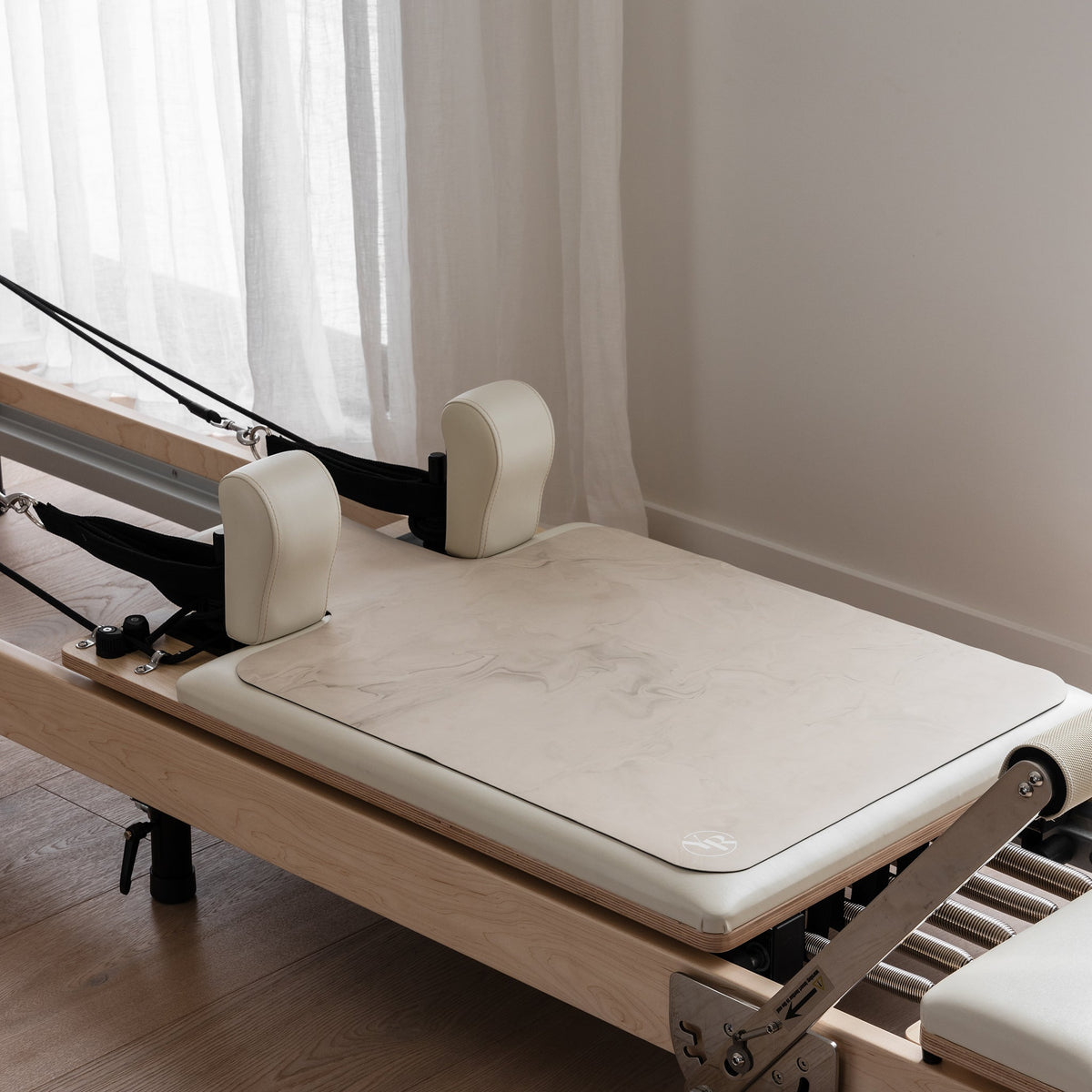Beige Non Slip Reformer Mat on Pilates Equipment - Lifestyle View | Your Reformer