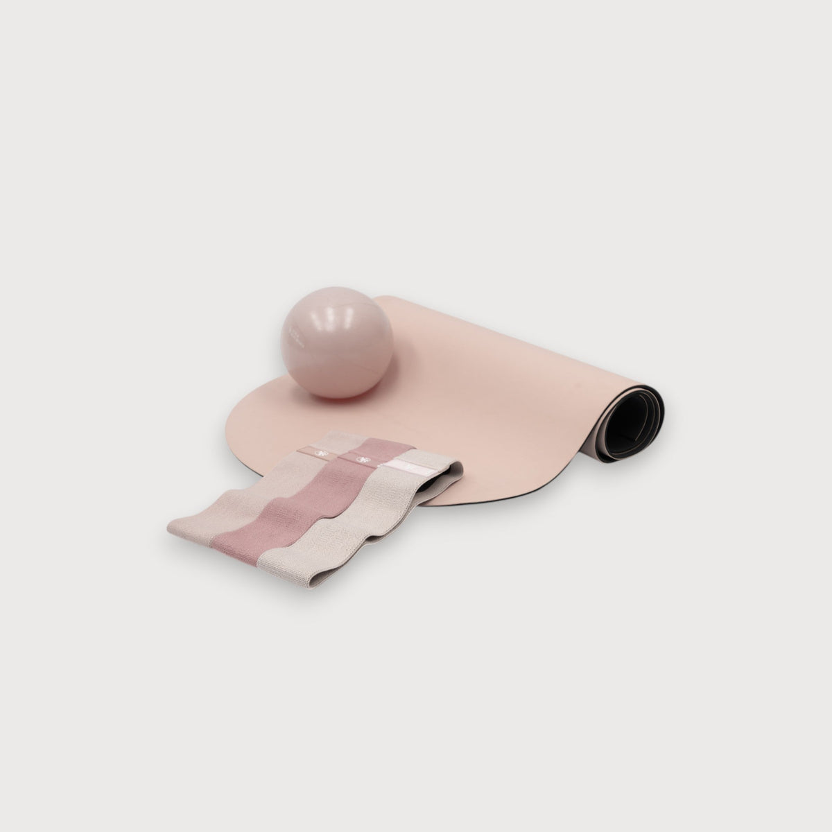 Blush Pink Pilates Mat Pack with Exercise Ball and Resistance Bands - Flat Lay | Your Reformer