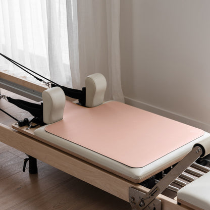 Blush Pink Non Slip Reformer Mat on Pilates Equipment - Lifestyle View | Your Reformer
