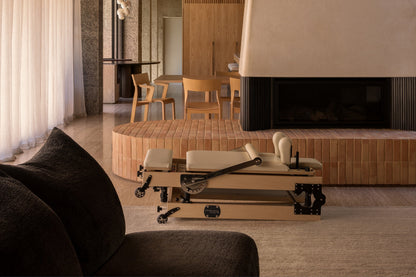 Maple Wood Pilates Reformer - Ivory Upholstery in Contemporary Living Space | Your Reformer