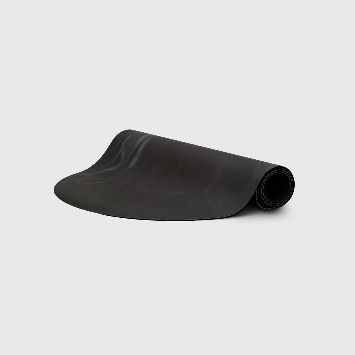 Ghosted Yoga Mat Black Wash - Dark Non-Slip Pilates Mat Partially Rolled | Your Reformer