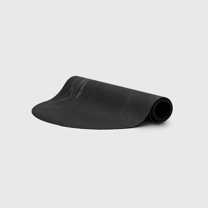Ghosted Yoga Mat Black Wash - Dark Non-Slip Pilates Mat Partially Rolled | Your Reformer
