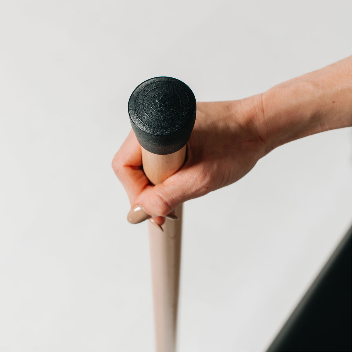 Black Rubber Cap Wood Pilates Pole - End Detail | Your Reformer