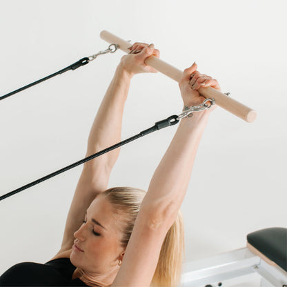 Pilates Maple Pole - Overhead Arm Exercise | Your Reformer