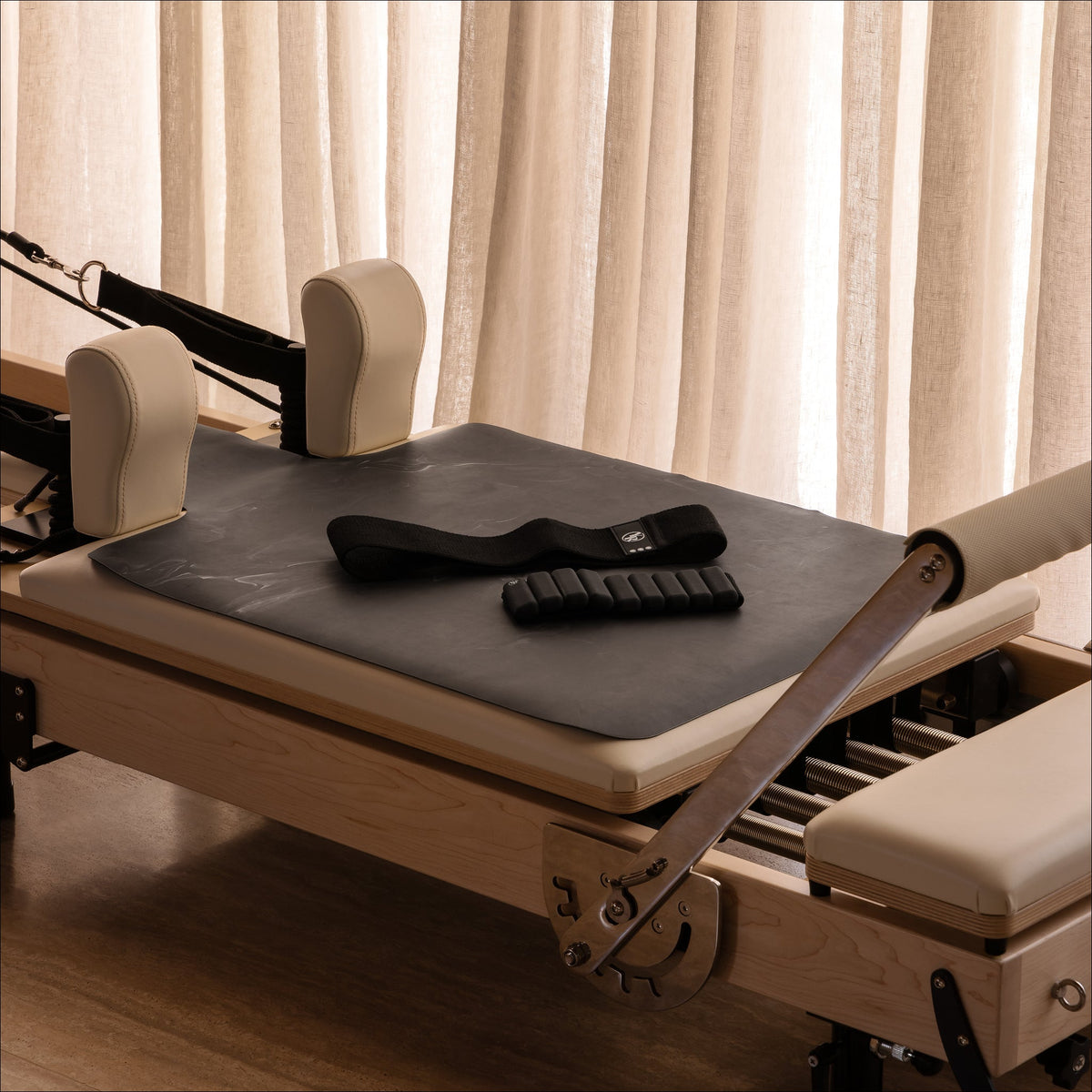 Black Wash Reformer Pack with Weighted Accessories - Side View | Your Reformer