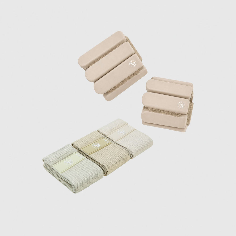 Warm Stone Pilates Strength Set - Ankle Weights & Resistance Bands Flat Lay | Your Reformer