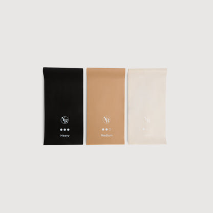 Core Neutrals Stretch Resistance Bands Light Medium Heavy - Flat Lay | Your Reformer