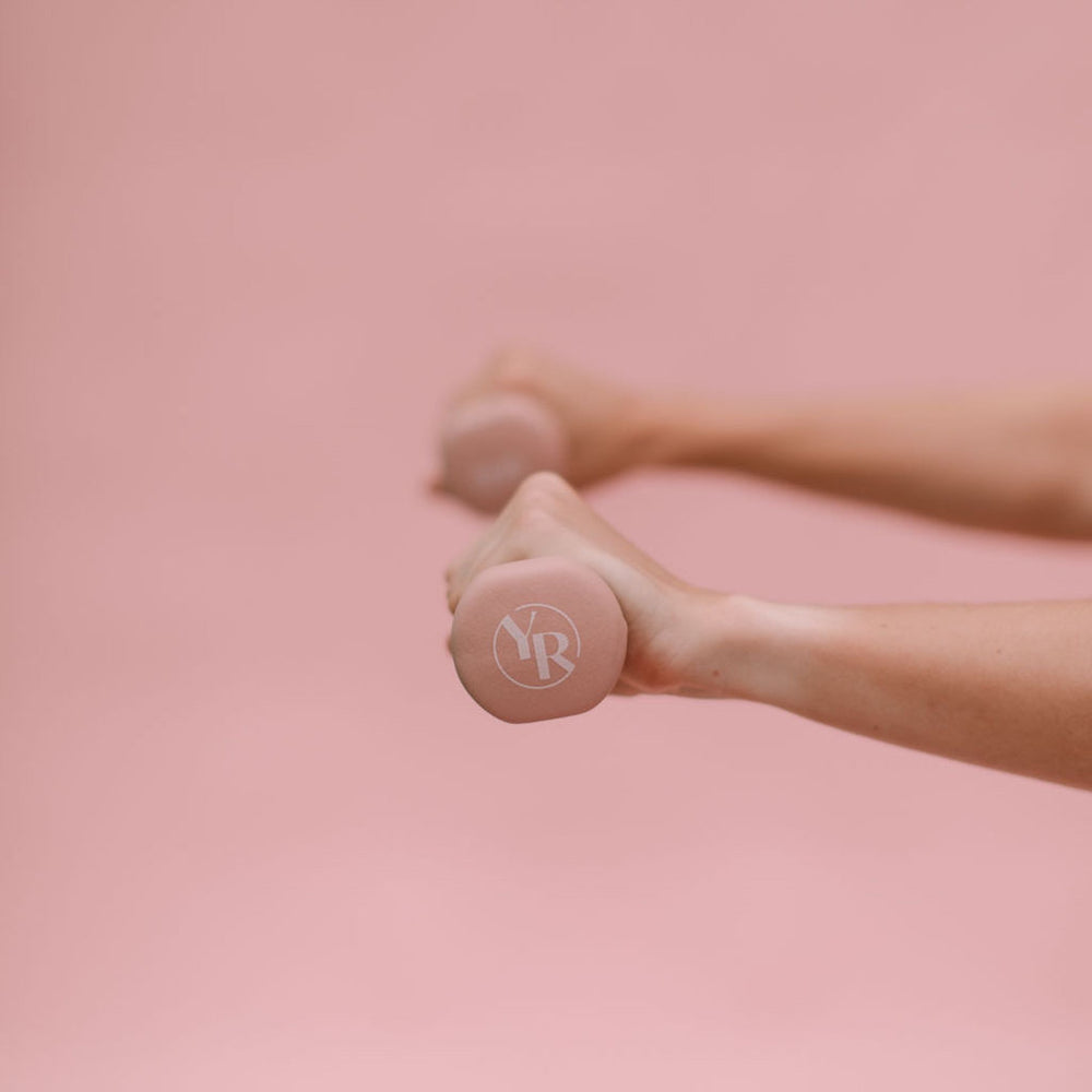 Blush Pilates Hand Weights in Use - Close-Up Detail | Your Reformer