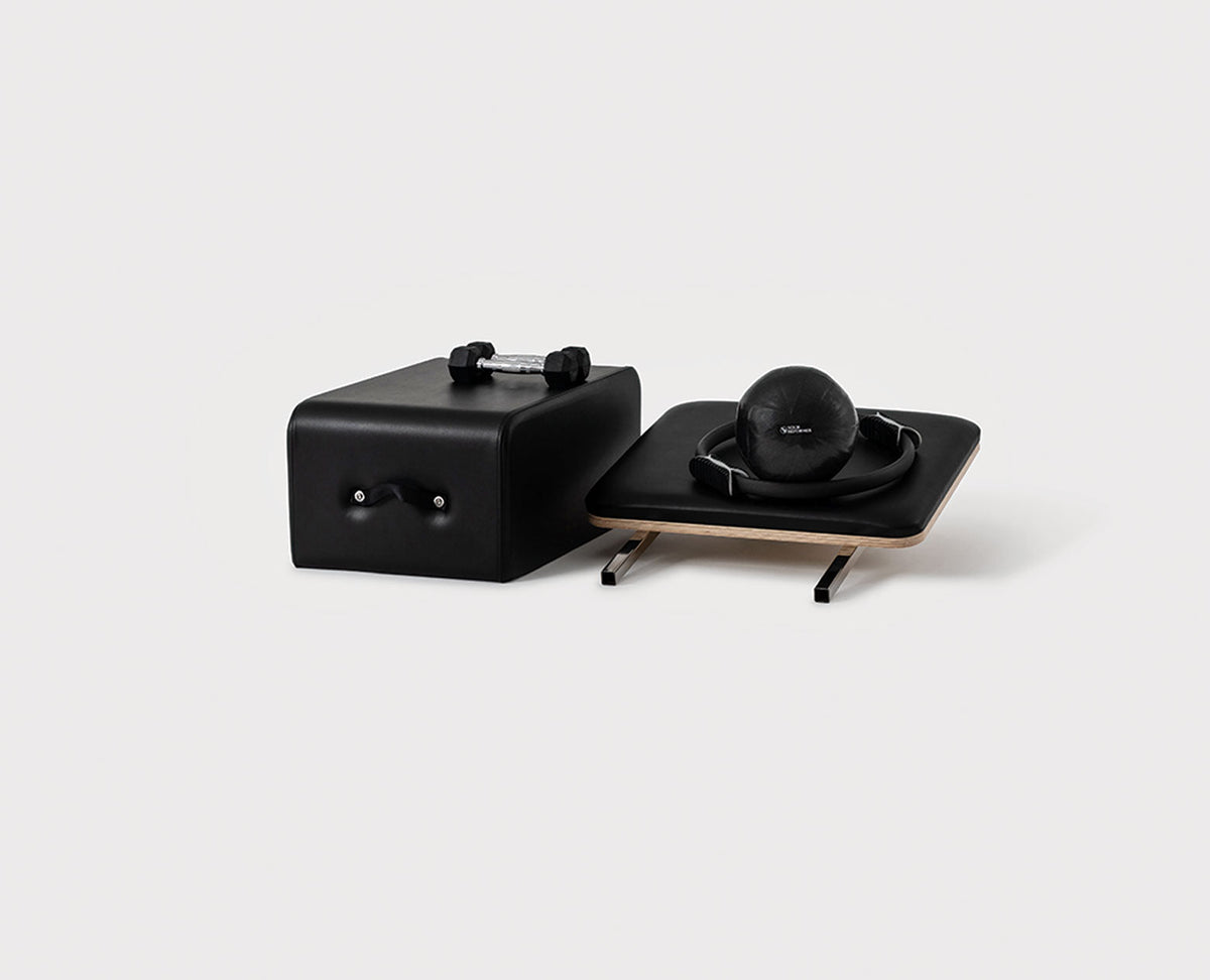 Black Pilates Rental Essentials Pack with Spine Corrector and Pilates Ball | Your Reformer