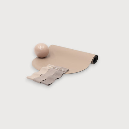 Mocha Brown Mat Pilates Kit with Exercise Ball and Resistance Bands - Flat Lay | Your Reformer