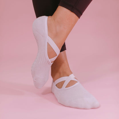 Soft Grey Ballet Grip Socks - Movement Action Shot | Your Reformer
