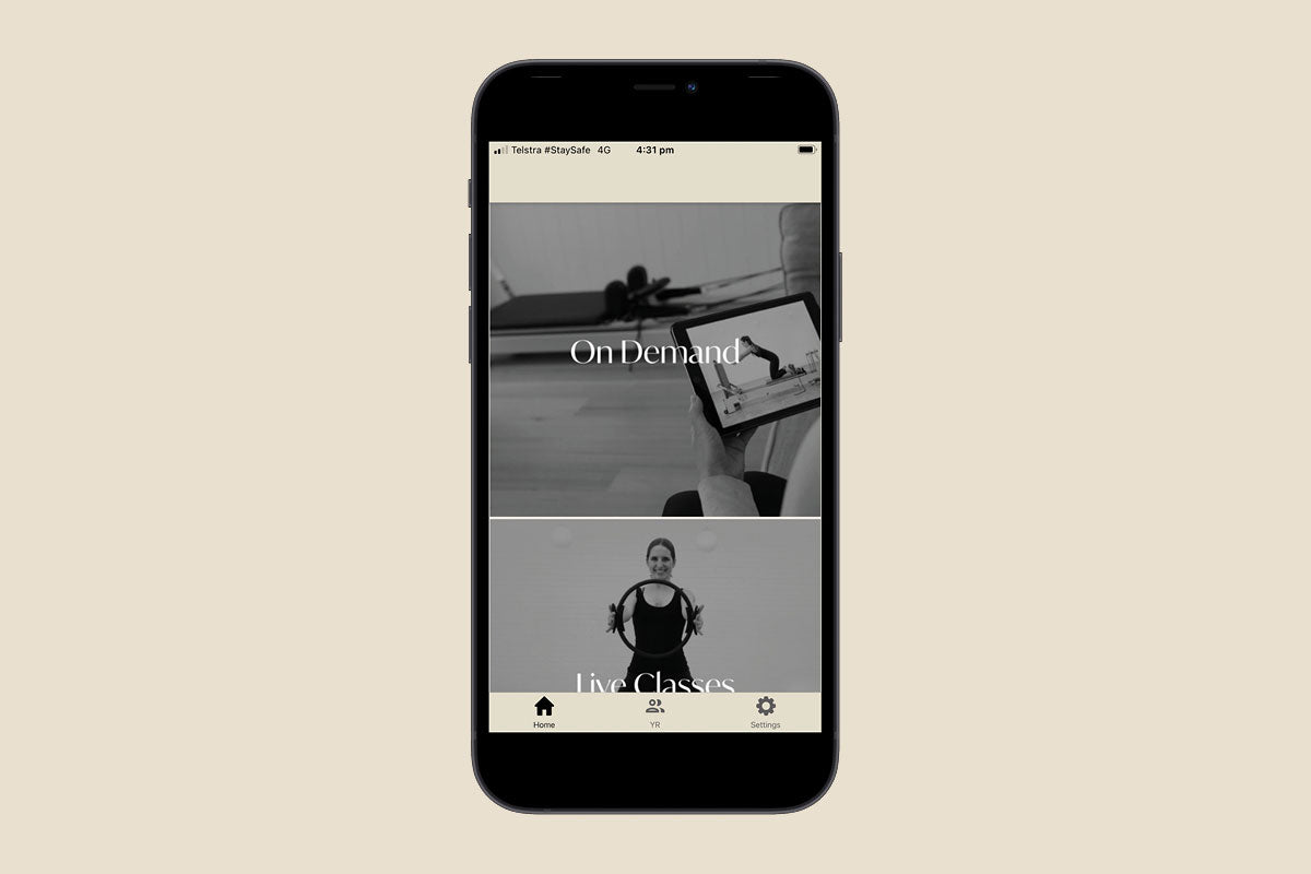 Black iPhone displaying Your Reformer OnDemand App Home Screen - Mobile View | Your Reformer