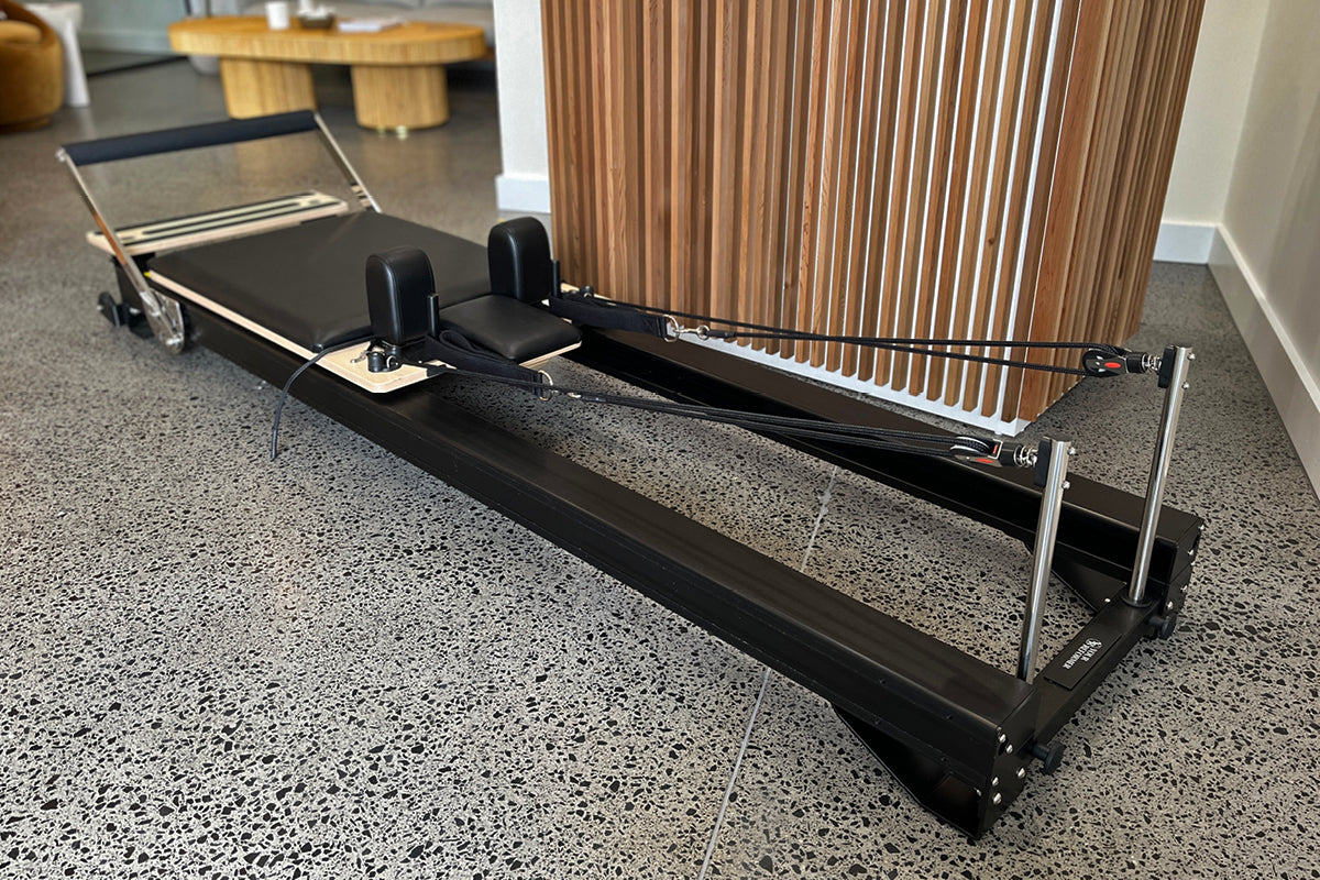 Black Studio X Pilates Reformer - Full Angled View with Cable System | Your Reformer