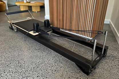 Black Studio X Pilates Reformer - Full Angled View with Cable System | Your Reformer